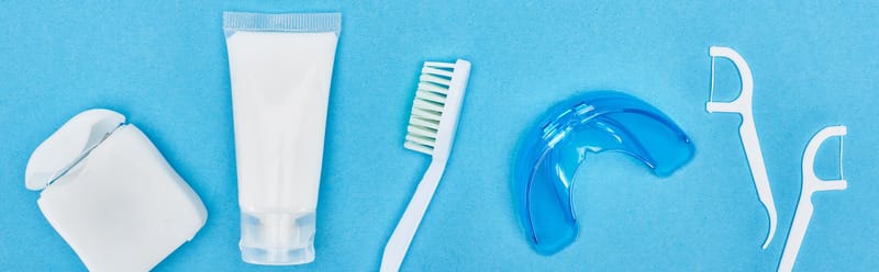 Toothbrush and fluoride toothpaste for fresher breath