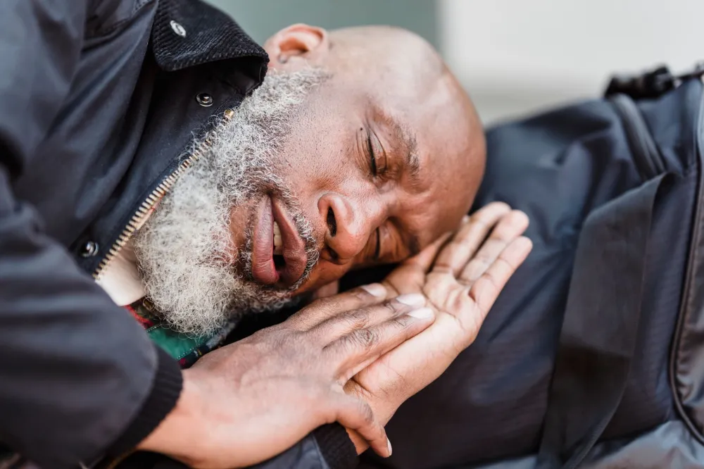 CBD & THC Oil for Dementia Agitation: What Research Says 2 Elderly woman resting calmly in bed with soft natural lighting