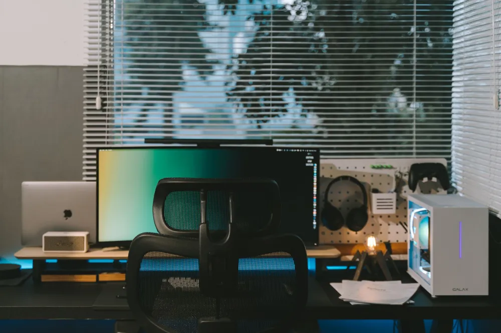 Desk Posture and Back Pain From Sitting All Day: What Works 2 Ergonomic office chair adjusted correctly to support lower back posture at desk