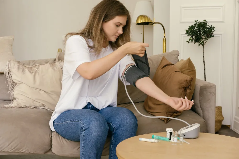 Person monitoring blood pressure at home as part of cardiovascular risk management