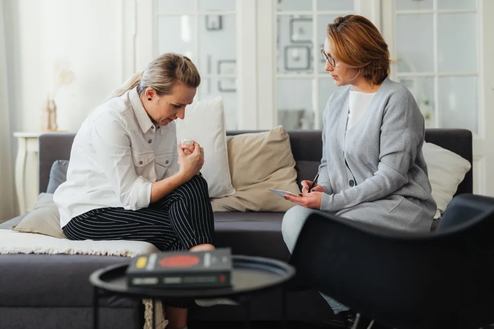 Woman speaking with a therapist about endometriosis-related anxiety and depression