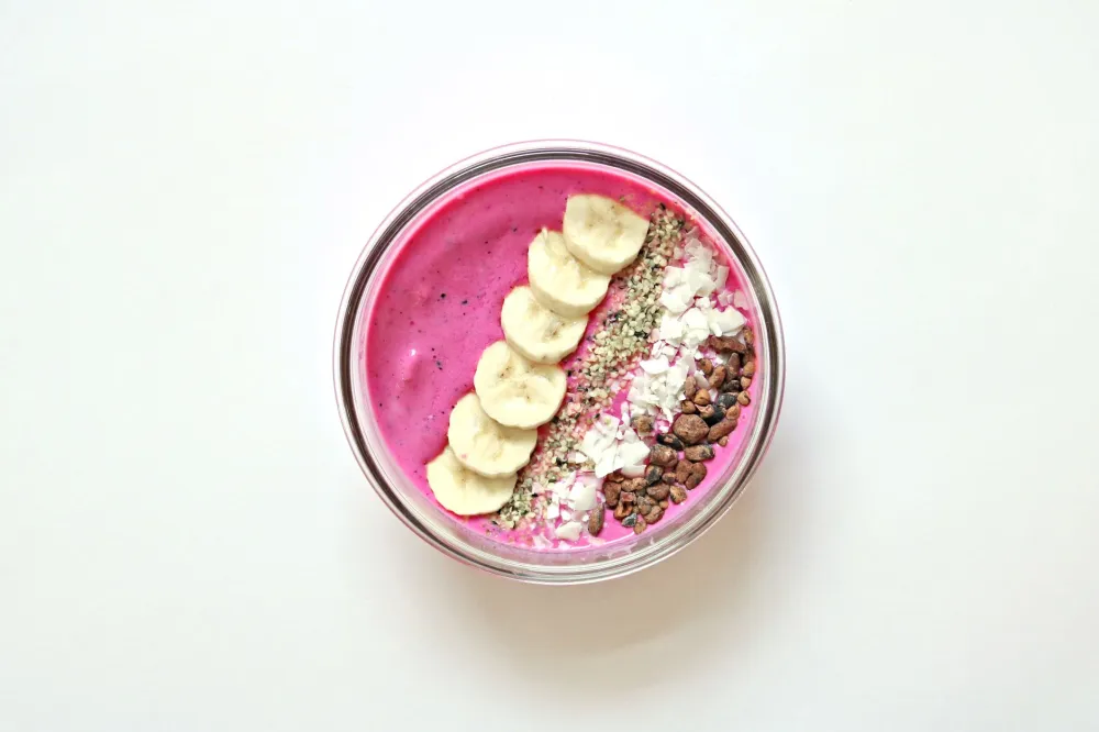 Colorful smoothie bowl with fruit and seeds supporting immune system nutrition