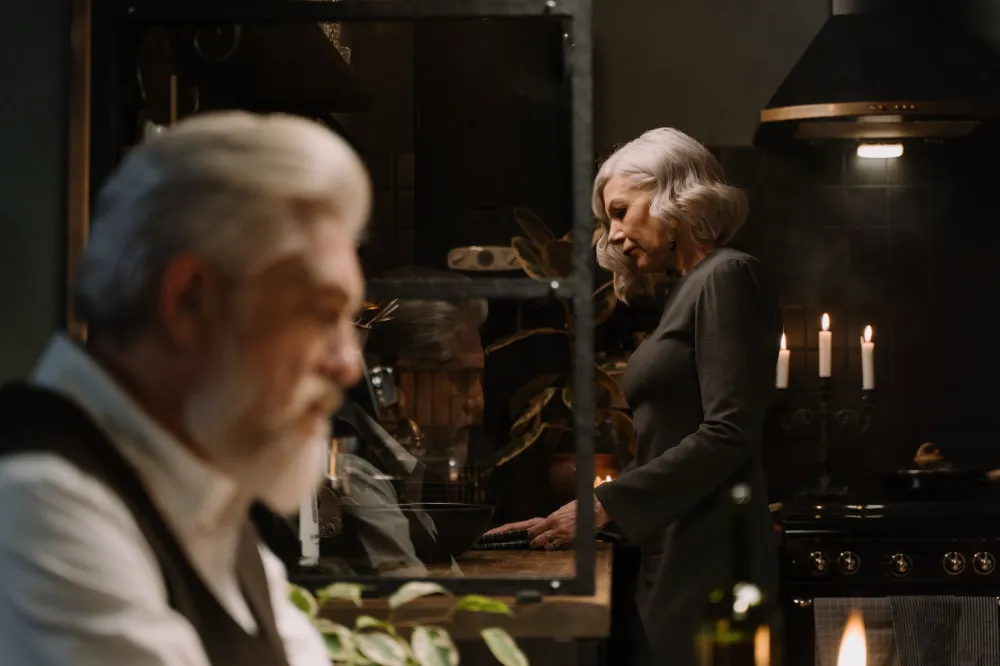 Senior couple preparing a healthy low carb keto meal together in kitchen
