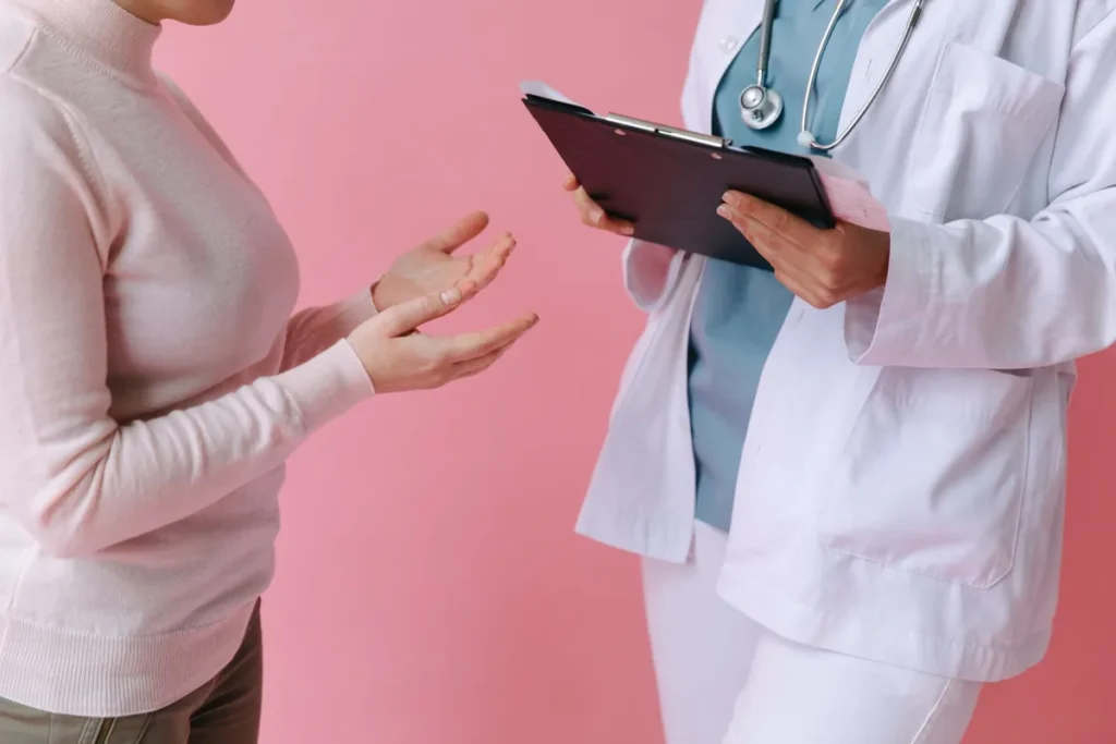 Doctor discussing GLP-1 drug treatment options with a patient in clinic