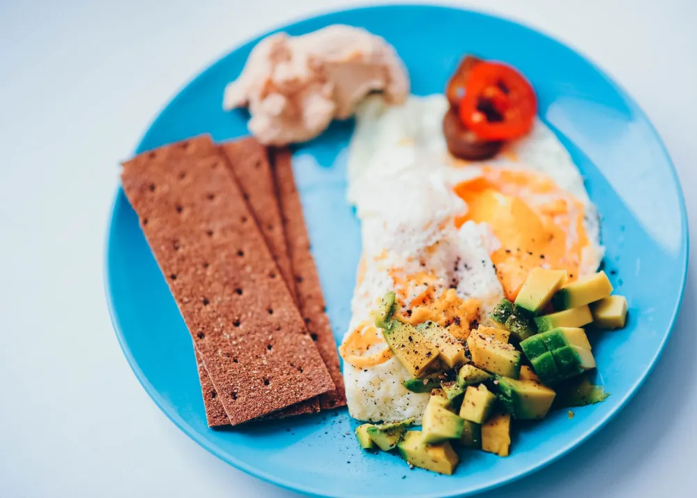 High-protein meal with chicken, eggs, and legumes to support muscle on GLP-1