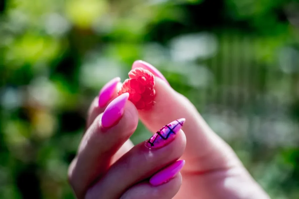 Close-up of healthy, well-groomed fingernails showing smooth nail surface and nail health