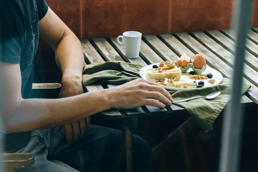 Biotin-rich foods including eggs, nuts, and spinach supporting nail health and growth