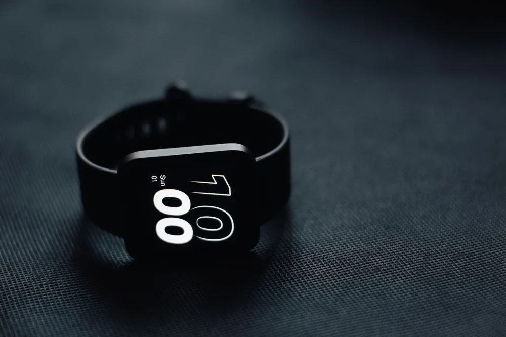 10,000 Steps a Day: What the Science Really Says 2 Fitness tracker on wrist displaying daily step count during a morning walk
