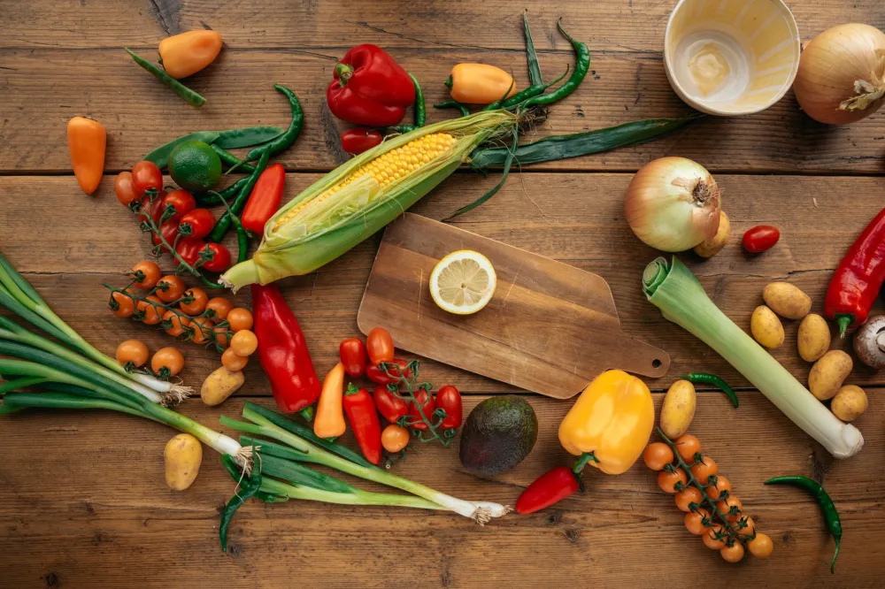 Colorful vegetables and whole foods laid out for immune-supporting meal prep
