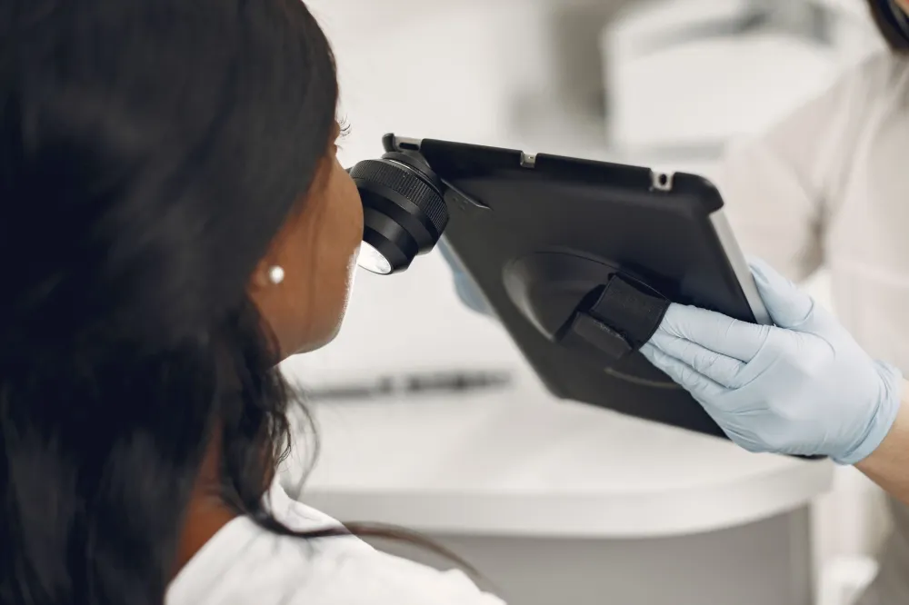 Hair Thinning: What It Is and What You Can Do Early 4 Dermatologist examining patient scalp for hair thinning and loss causes
