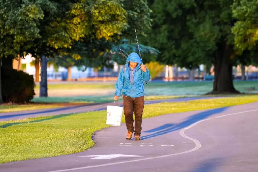 Light Drinking & Brain Health: What the Research Really Says 3 Person walking briskly in a park as part of a daily brain-health routine