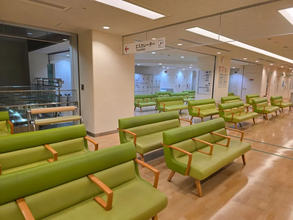 Patients waiting in a community health center that offers sliding-scale payment options