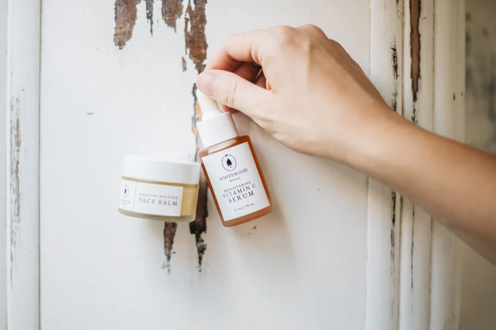 Gentle moisturizer and barrier repair skincare products arranged on a white surface