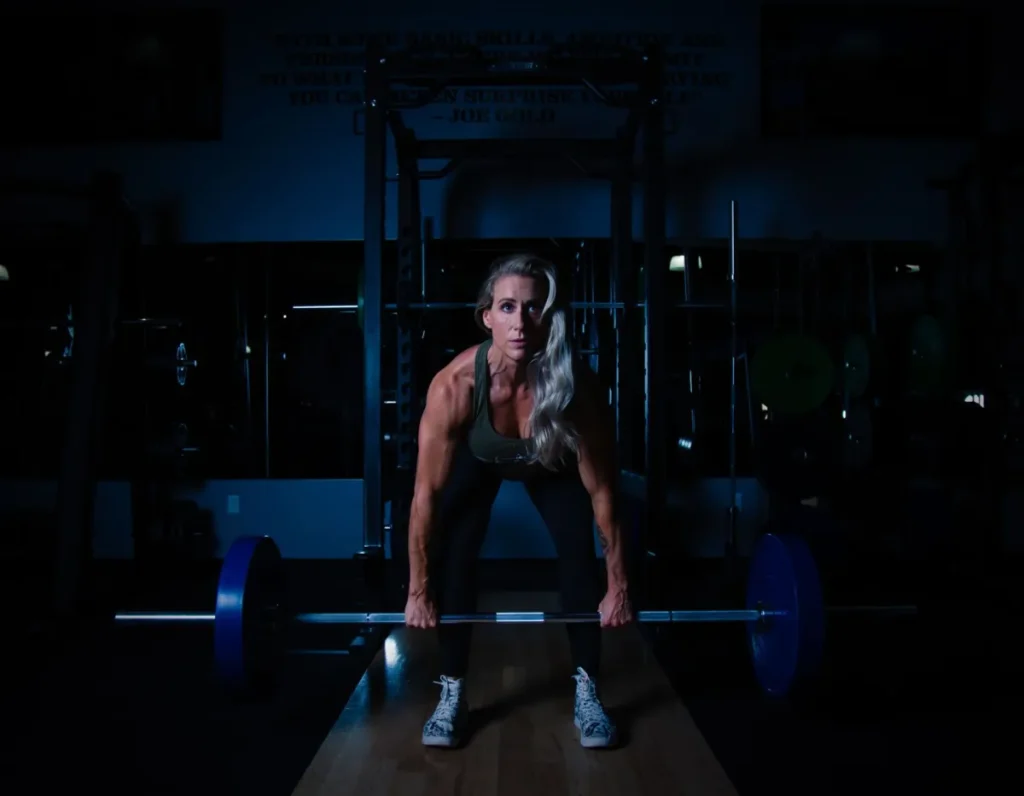 Woman doing strength training with dumbbells for long-term weight loss results
