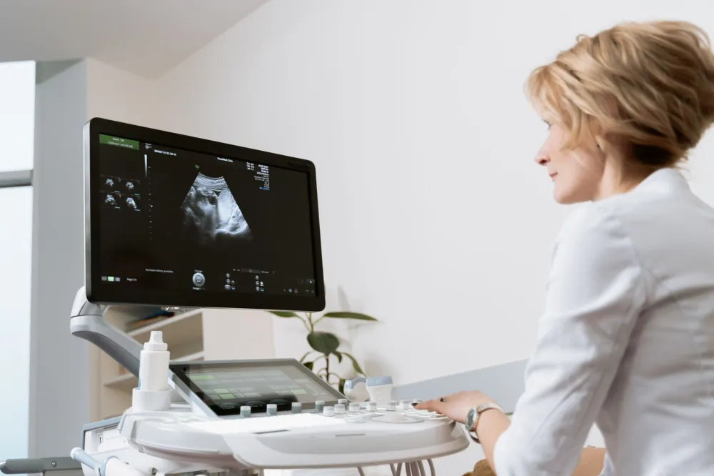 Woman speaking openly with a gynecologist about genital skin symptoms and bumps