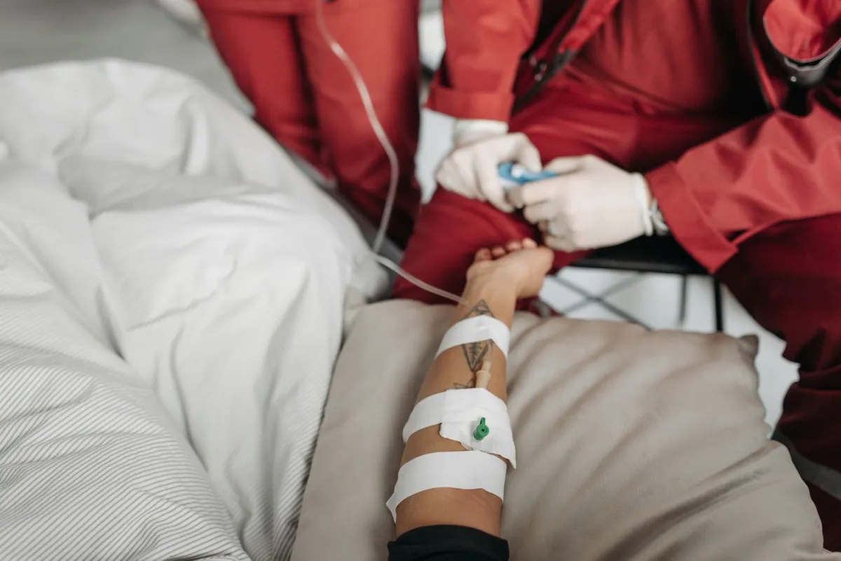 Person receiving IV drips for hangovers at a wellness clinic