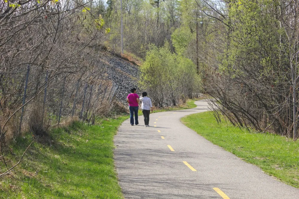 Couple taking a gentle walk outdoors during their first weeks of keto