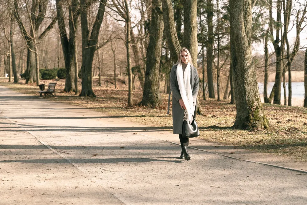 Woman taking a gentle walk in the park during the keto adaptation period